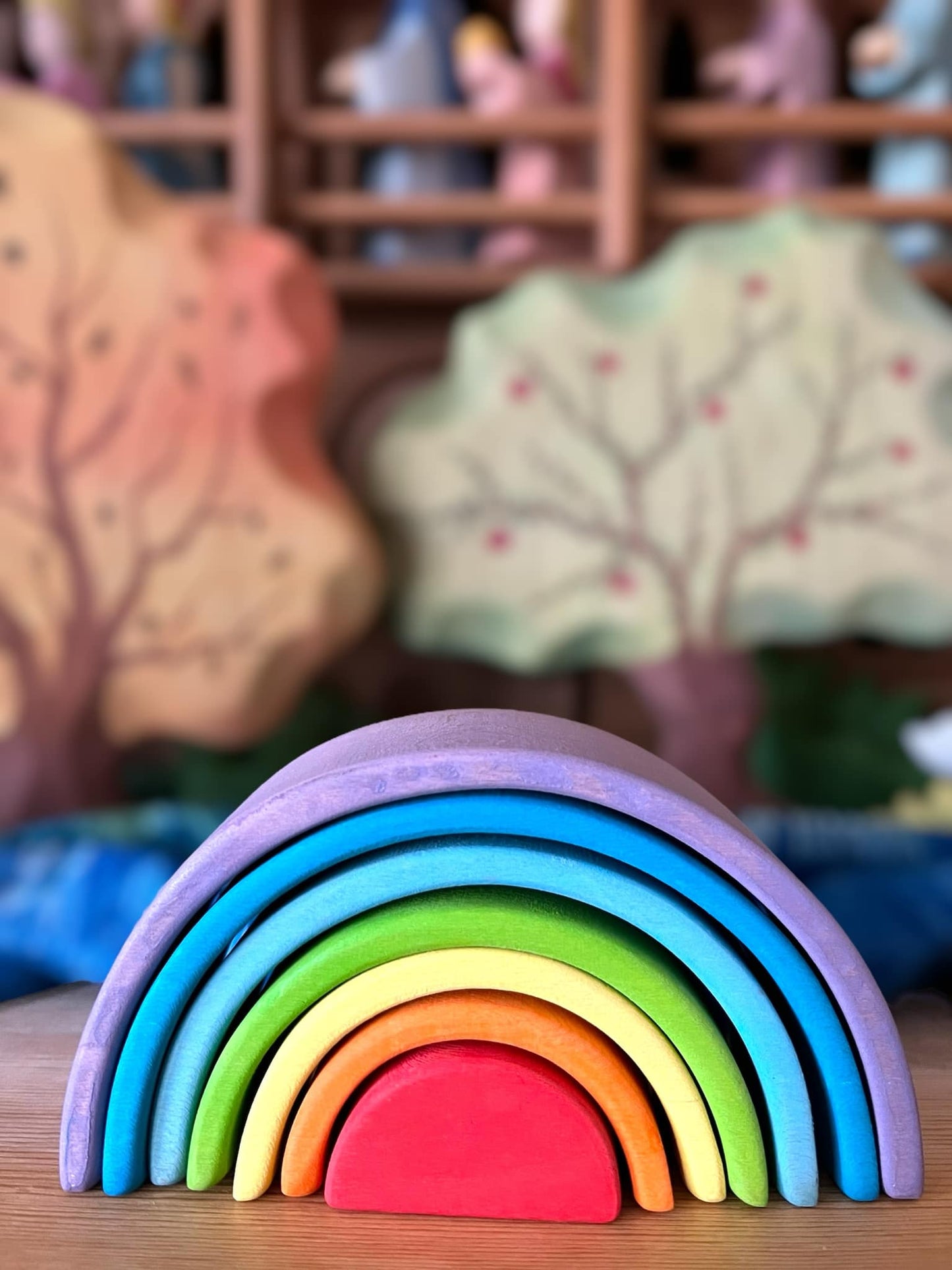 7 pcs stained mini wooden rainbow stacker in stained purple sunset color