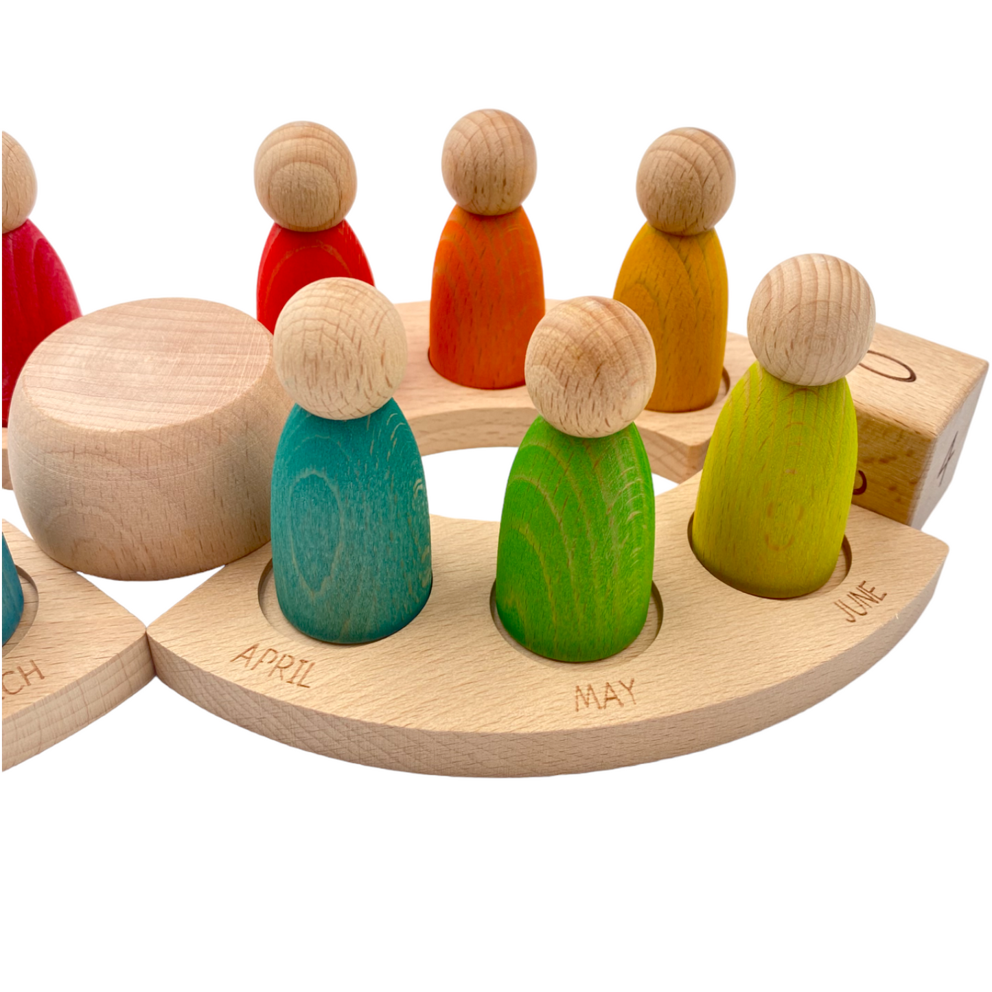 wooden perpetual calendar with 12 stained rainbow peg figures