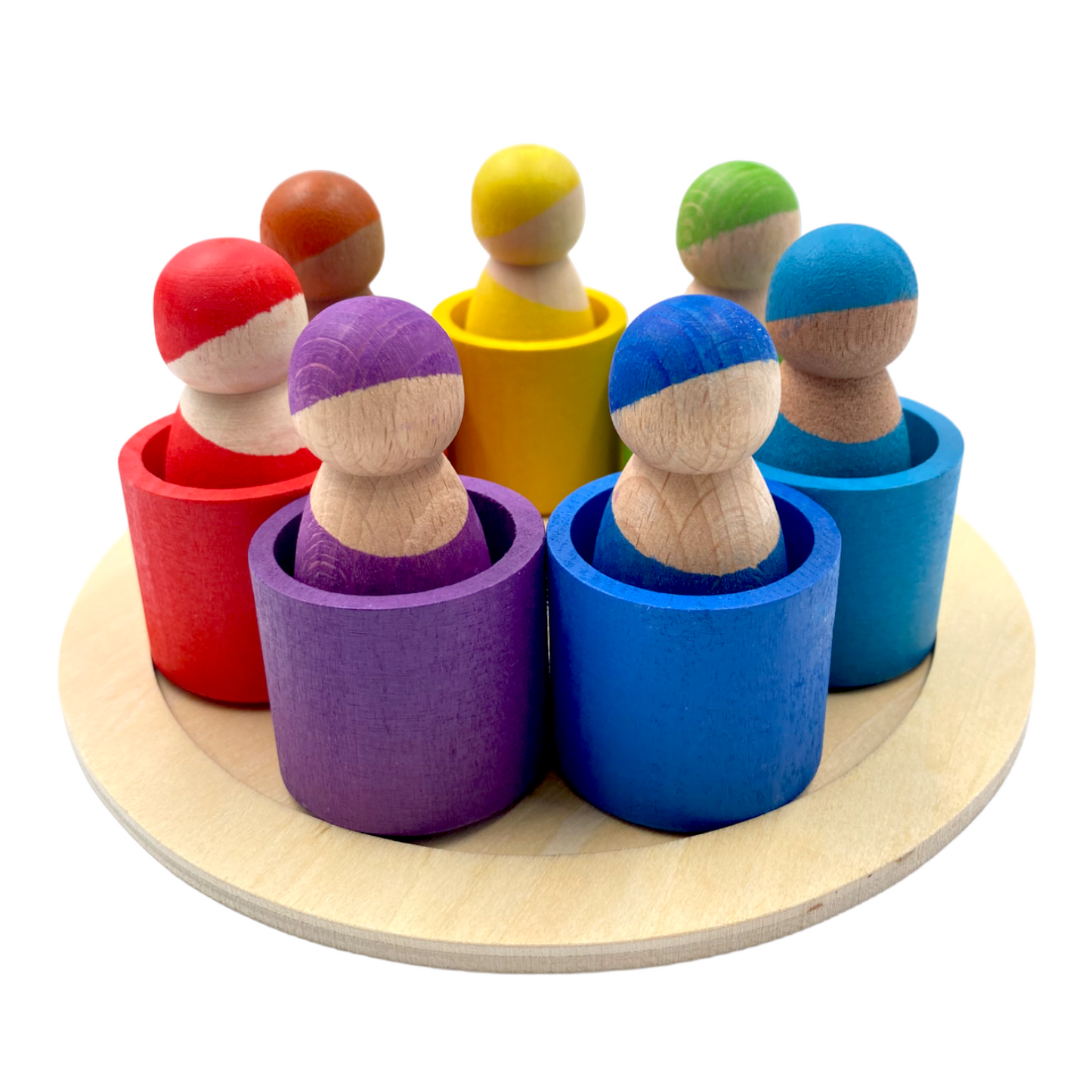 7 different skin stones stained rainbow wooden peg dolls in bowls