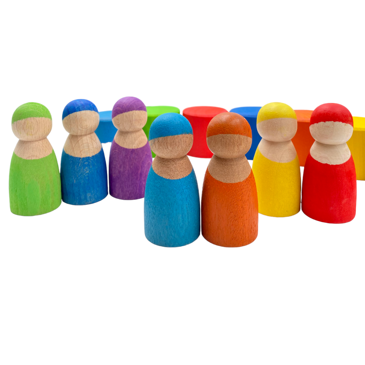 7 different skin stones stained rainbow wooden peg dolls in bowls
