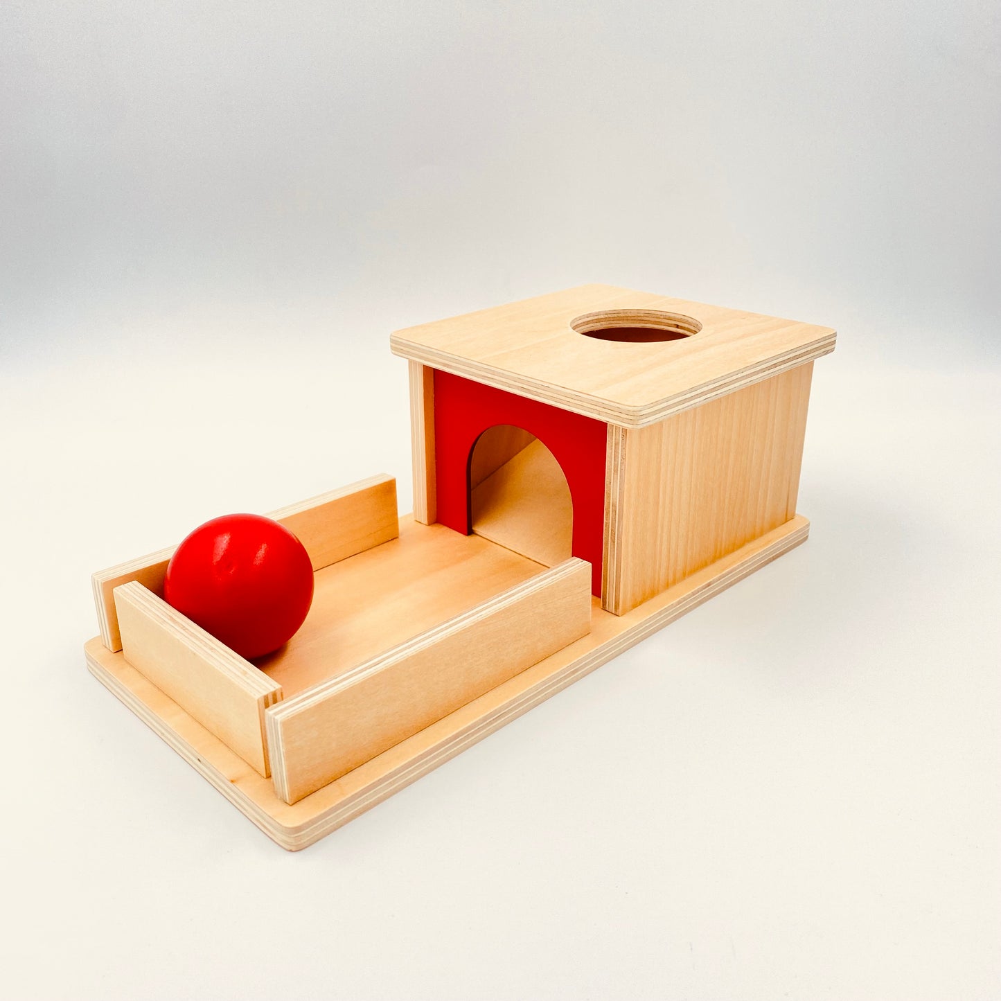montessori object permanence box with tray and ball