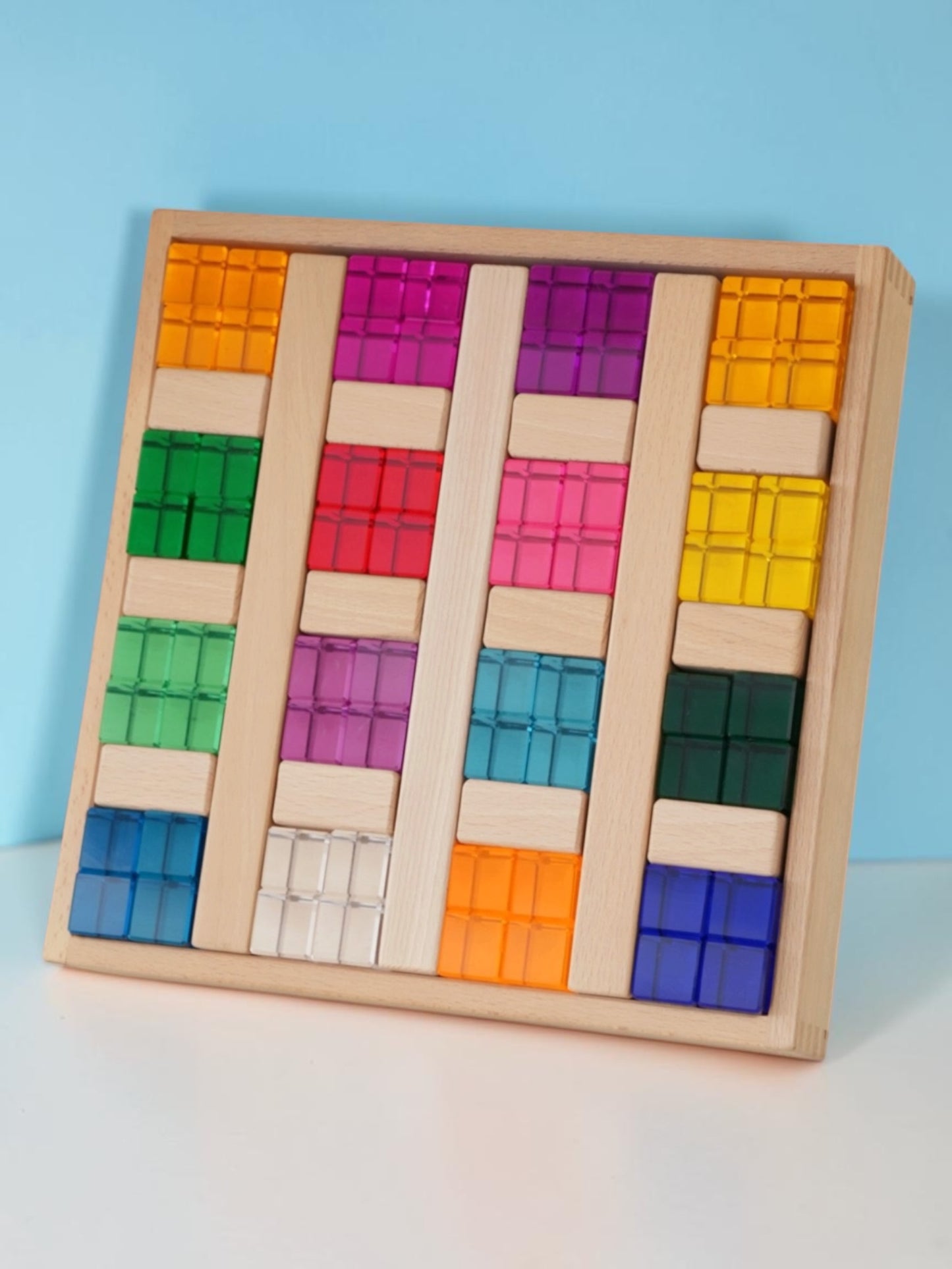 **pre-order (ships in 2-3 weeks)**64-piece rainbow crystal stones & interlocking slats building set with storage tray