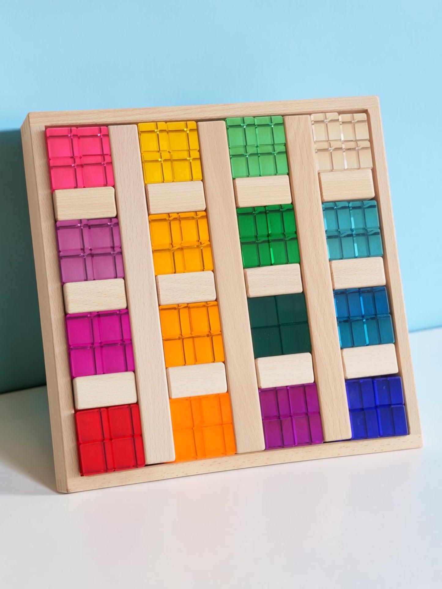 **pre-order (ships in 2-3 weeks)**64-piece rainbow crystal stones & interlocking slats building set with storage tray