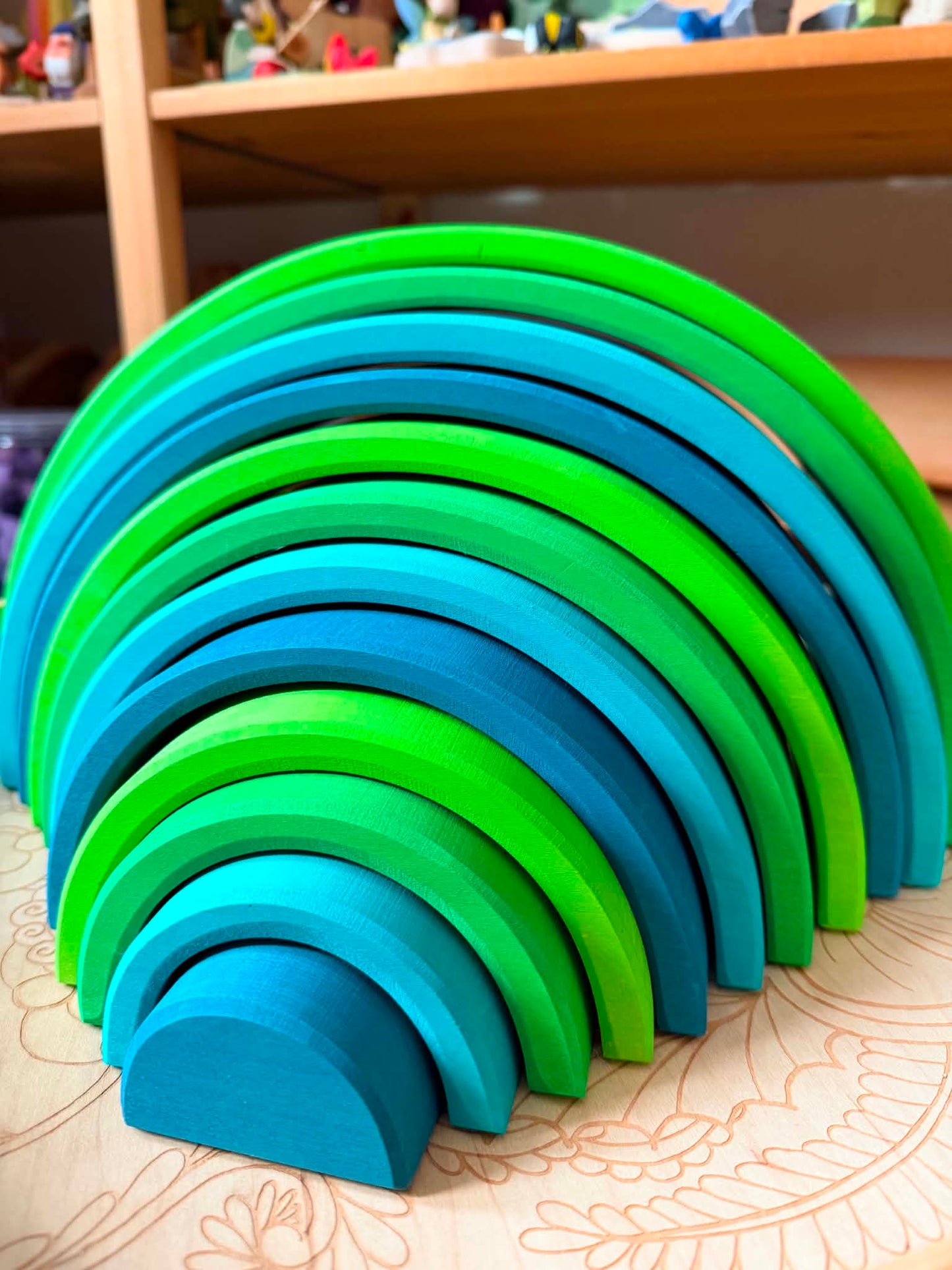 **pre-order (ships in 2-3 weeks)**12-piece stained large basswood rainbow stacking blocks – meadow green