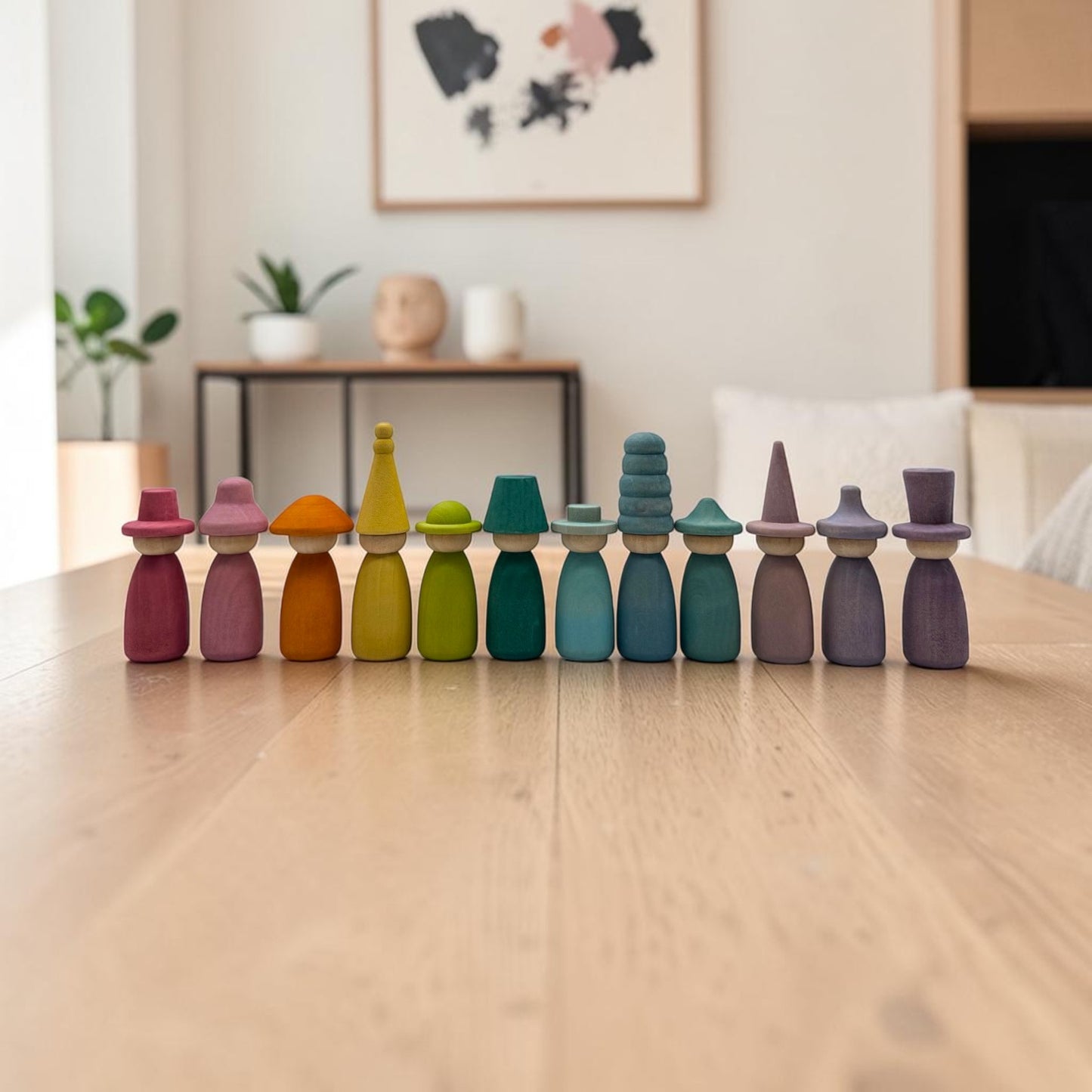 12 piece stained wooden peg dolls with interchangeable hats