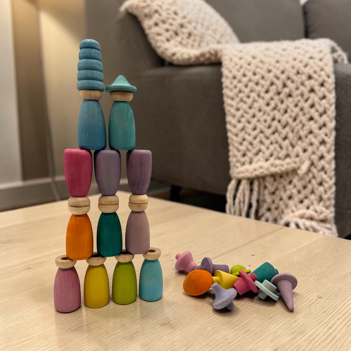 12 piece stained wooden peg dolls with interchangeable hats