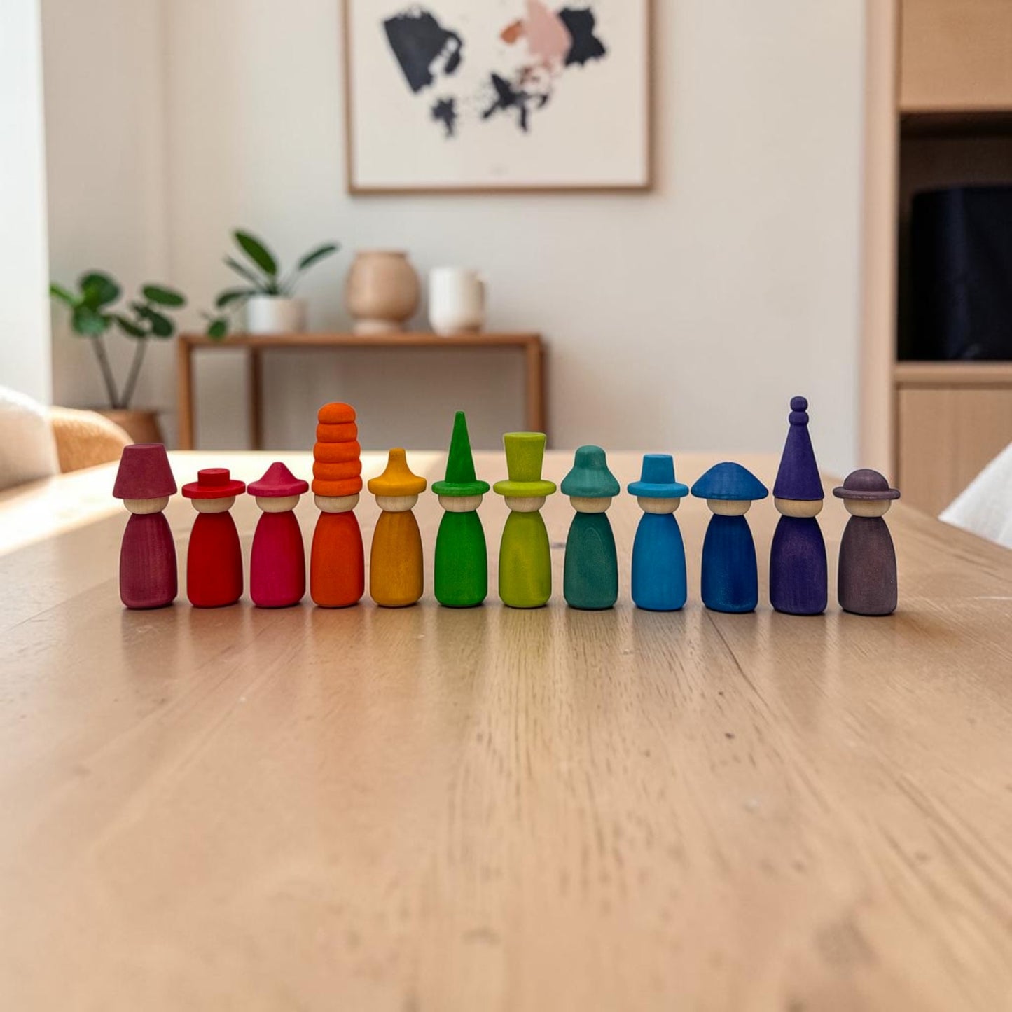 12 piece stained wooden peg dolls with interchangeable hats