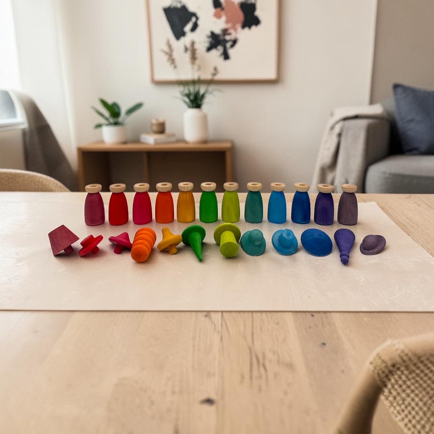 12 piece stained wooden peg dolls with interchangeable hats
