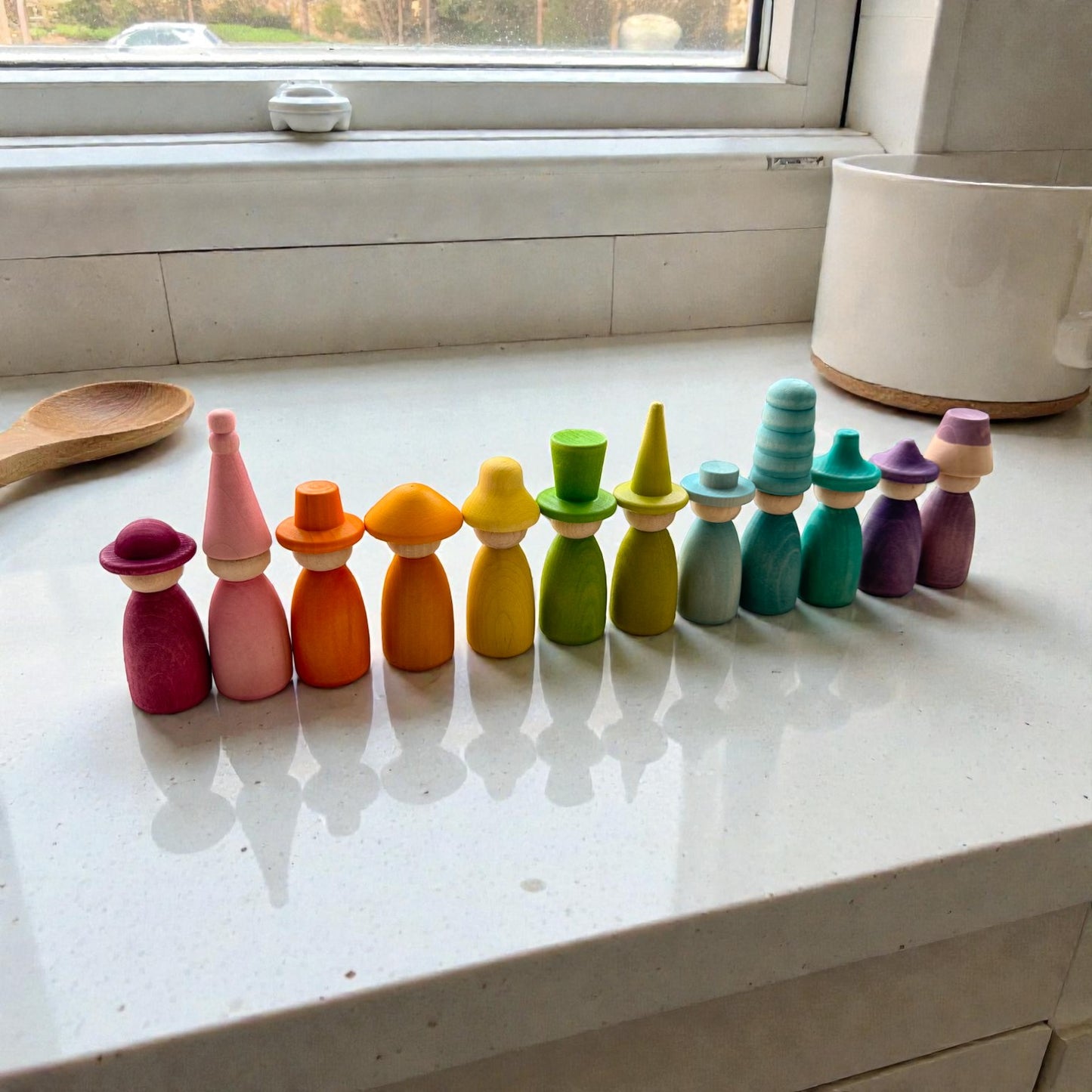 12 piece pastel macaron wooden peg dolls with interchangeable hats open ended play figures